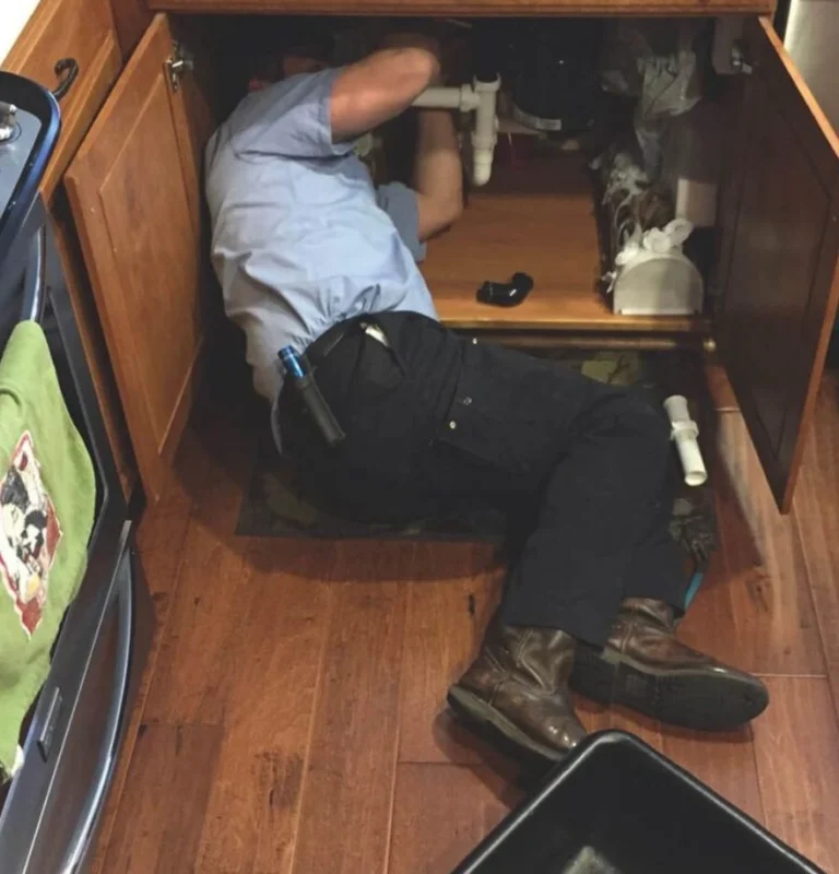 Plumber under kitchen in El Cajon, CA Plumber under kitchen in El Cajon, CA